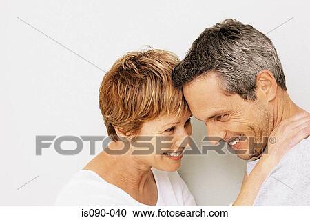 Man and woman embracing View Large Photo Image Stock Image - Man and woman embracing. Fotosearch