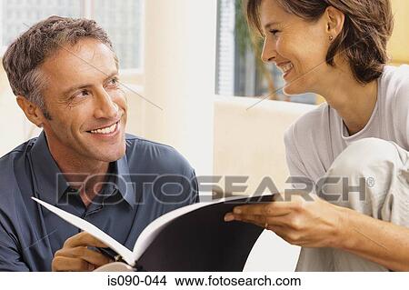 Man and woman working together View Large Photo Image Picture - Man and woman working together. Fotosearch