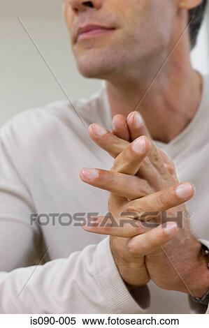 Man with clasped hands View Large Photo Image Stock Photography - Man with clasped hands. Fotosearch