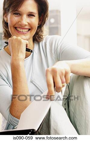 Portrait of a woman View Large Photo Image Stock Photo - Portrait of a woman. Fotosearch