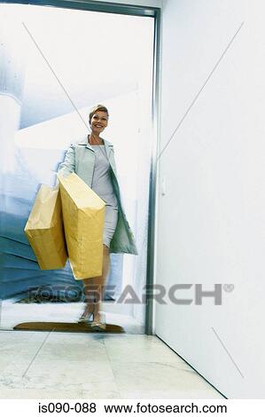 Woman with shopping bags View Large Photo Image Stock Photo - Woman with shopping bags. Fotosearch