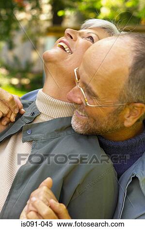 Couple hugging View Large Photo Image Stock Photography - Couple hugging. Fotosearch