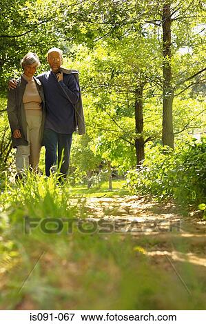 Couple in park View Large Photo Image Stock Photo - Couple in park. Fotosearch
