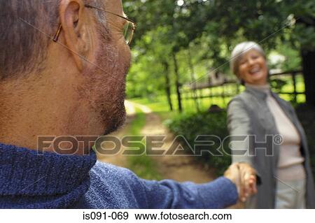 Couple in park View Large Photo Image Stock Photo - Couple in park. Fotosearch