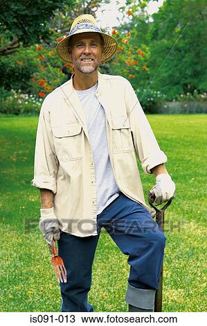 Man gardening View Large Photo Image Stock Image - Man gardening. Fotosearch