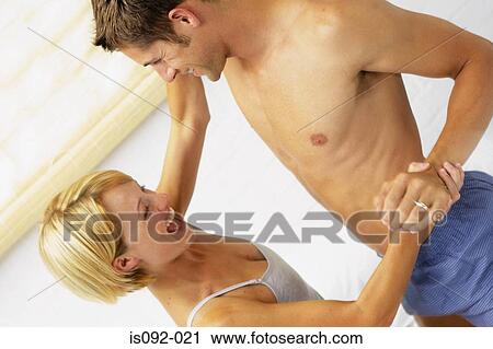Couple playing View Large Photo Image Stock Image - Couple playing. Fotosearch