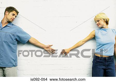 Couple with outstretched arms View Large Photo Image Picture - Couple with outstretched arms. Fotosearch