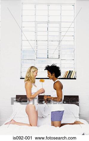 Woman receiving flower View Large Photo Image Stock Image - Woman receiving flower. Fotosearch