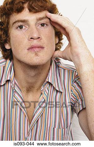 Man holding his head View Large Photo Image Picture - Man holding his head. Fotosearch