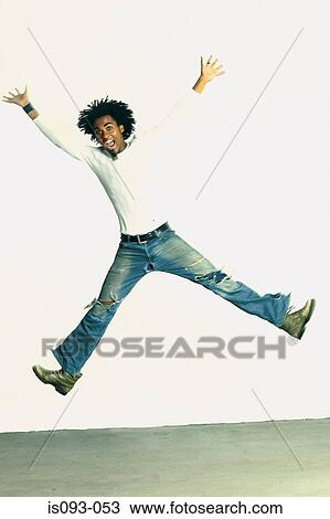 Stock Image - Man jumping. Fotosearch