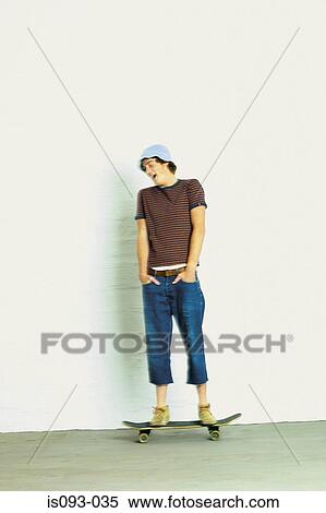 Man on skateboard View Large Photo Image Stock Photography - Man on skateboard. Fotosearch