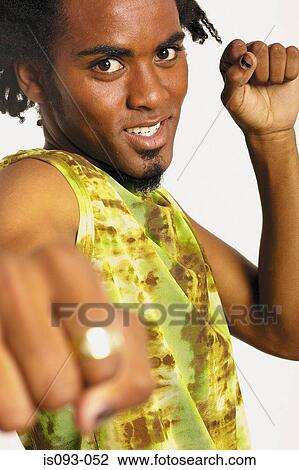 Man poised to fight View Large Photo Image Stock Image - Man poised to fight. Fotosearch