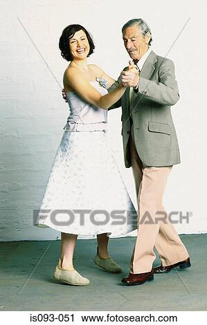 Woman dancing with old man View Large Photo Image Stock Image - Woman dancing with old man. Fotosearch