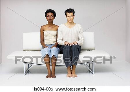 Man and woman seated View Large Photo Image Stock Photography - Man and woman seated. Fotosearch