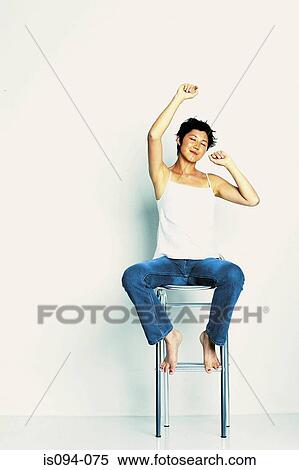 Woman stretching View Large Photo Image Stock Photography - Woman stretching. Fotosearch