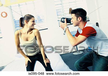 Teenage boy and girl modelling View Large Photo Image Stock Photo - Teenage boy and girl modelling. Fotosearch