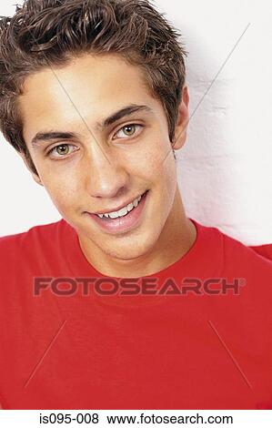 Teenage boy smiling View Large Photo Image Stock Photo - Teenage boy smiling. Fotosearch