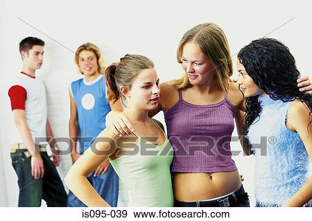 Teenage boys and girls flirting View Large Photo Image Stock Photo - Teenage boys and girls flirting. Fotosearch