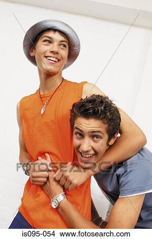 Teenage boys wrestling View Large Photo Image Picture - Teenage boys wrestling. Fotosearch