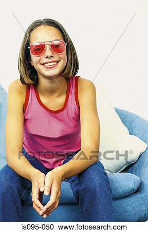 Stock Image - Teenage girl smiling. Fotosearch