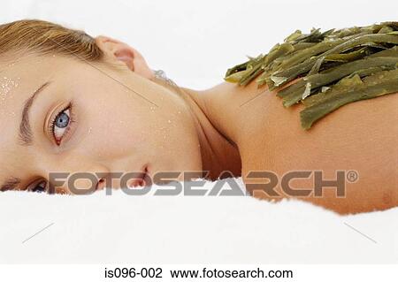 Woman receiving alternative treatment View Large Photo Image Stock Image - Woman receiving alternative treatment. Fotosearch