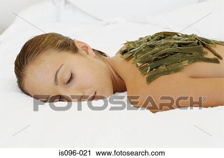 Woman receiving alternative treatment View Large Photo Image Stock Image - Woman receiving alternative treatment. Fotosearch