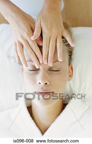 Woman receiving facial massage View Large Photo Image Stock Photo - Woman receiving facial massage. Fotosearch