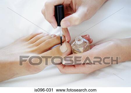 Woman receiving podiatry treatment View Large Photo Image Stock Image - Woman receiving podiatry treatment. Fotosearch