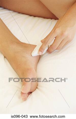 Woman receiving podiatry treatment View Large Photo Image Stock Image - Woman receiving podiatry treatment. Fotosearch