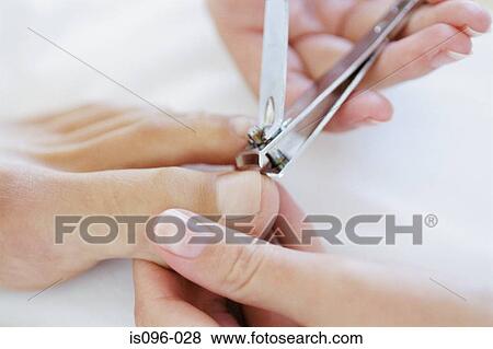 Woman receiving podiatry treatment View Large Photo Image Stock Photo - Woman receiving podiatry treatment. Fotosearch