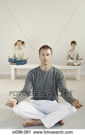 Man meditating View Large Photo Image Stock Photo - Man meditating. Fotosearch