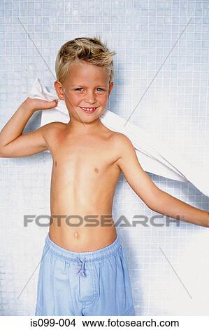 Boy drying himself View Large Photo Image Picture - Boy drying himself. Fotosearch