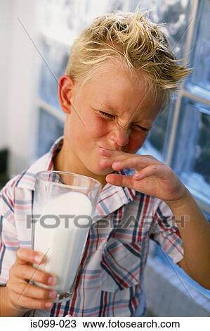Boy eating ice cream View Large Photo Image Stock Image - Boy eating ice cream. Fotosearch