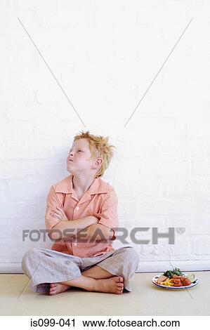 Boy refusing his food View Large Photo Image Stock Image - Boy refusing his food. Fotosearch