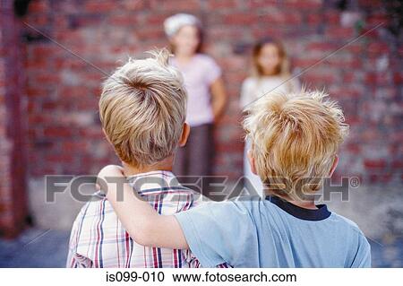 Boys and girls facing each other View Large Photo Image Stock Image - Boys and girls facing each other. Fotosearch