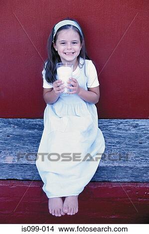 Girl drinking milk View Large Photo Image Picture - Girl drinking milk. Fotosearch