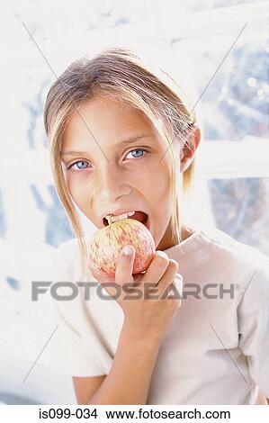 Girl eating View Large Photo Image Picture - Girl eating. Fotosearch