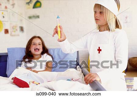 Girls playing doctor View Large Photo Image Stock Image - Girls playing doctor. Fotosearch