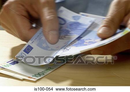 Stock Photo - Counting money. Fotosearch - Search Stock Images, Mural Photographs, Pictures, and Clipart Photos