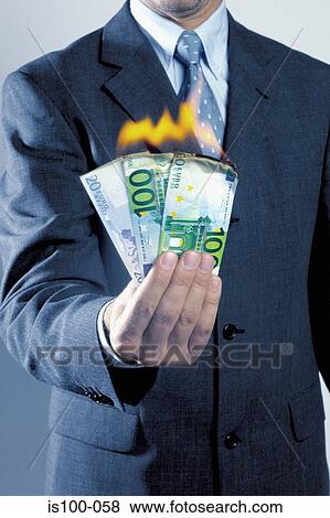 Stock Photo - Man burning money. Fotosearch