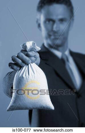 Man with bag of euro View Large Photo Image Stock Photo - Man with bag of euro. Fotosearch