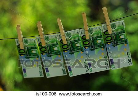 Stock Photograph - Money on clothes line. Fotosearch