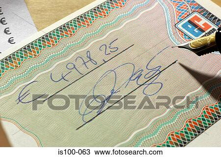 Signing a cheque View Large Photo Image Stock Image - Signing a cheque. Fotosearch