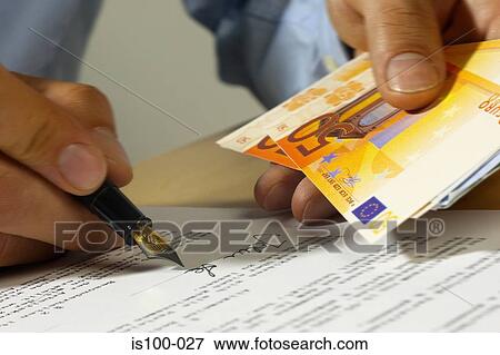 Signing a document View Large Photo Image Stock Photo - Signing a document. Fotosearch