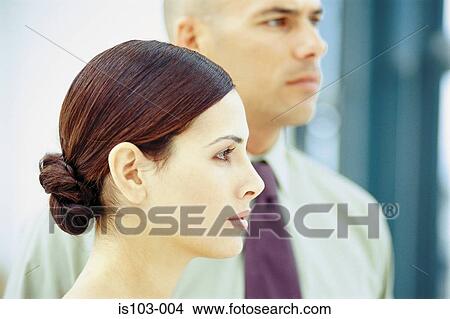 Portrait of a businessman and businesswoman View Large Photo Image Picture - Portrait of a businessman and businesswoman. Fotosearch