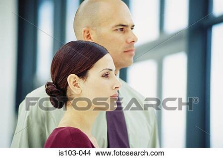 Picture - Portrait of a businessman and businesswoman. Fotosearch
