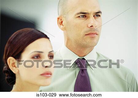 Stock Photo - Portrait of a businessman and businesswoman. Fotosearch