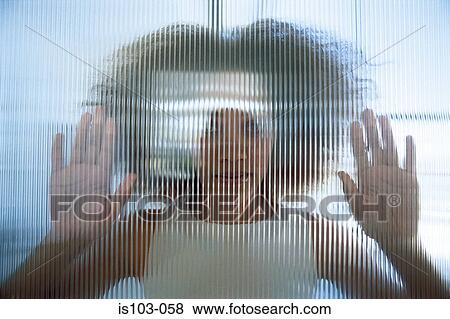 Portrait of a businesswoman behind a screen View Large Photo Image Stock Photo - Portrait of a businesswoman behind a screen. Fotosearch