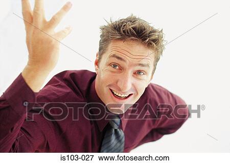 Stock Photo - Portrait of businessman gesturing. Fotosearch