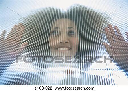 Portrait of businesswoman behind a glass screen View Large Photo Image Stock Image - Portrait of businesswoman behind a glass screen. Fotosearch